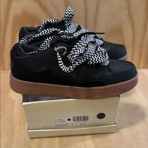 Abata leather sneakers Women’s size 10
Brand New